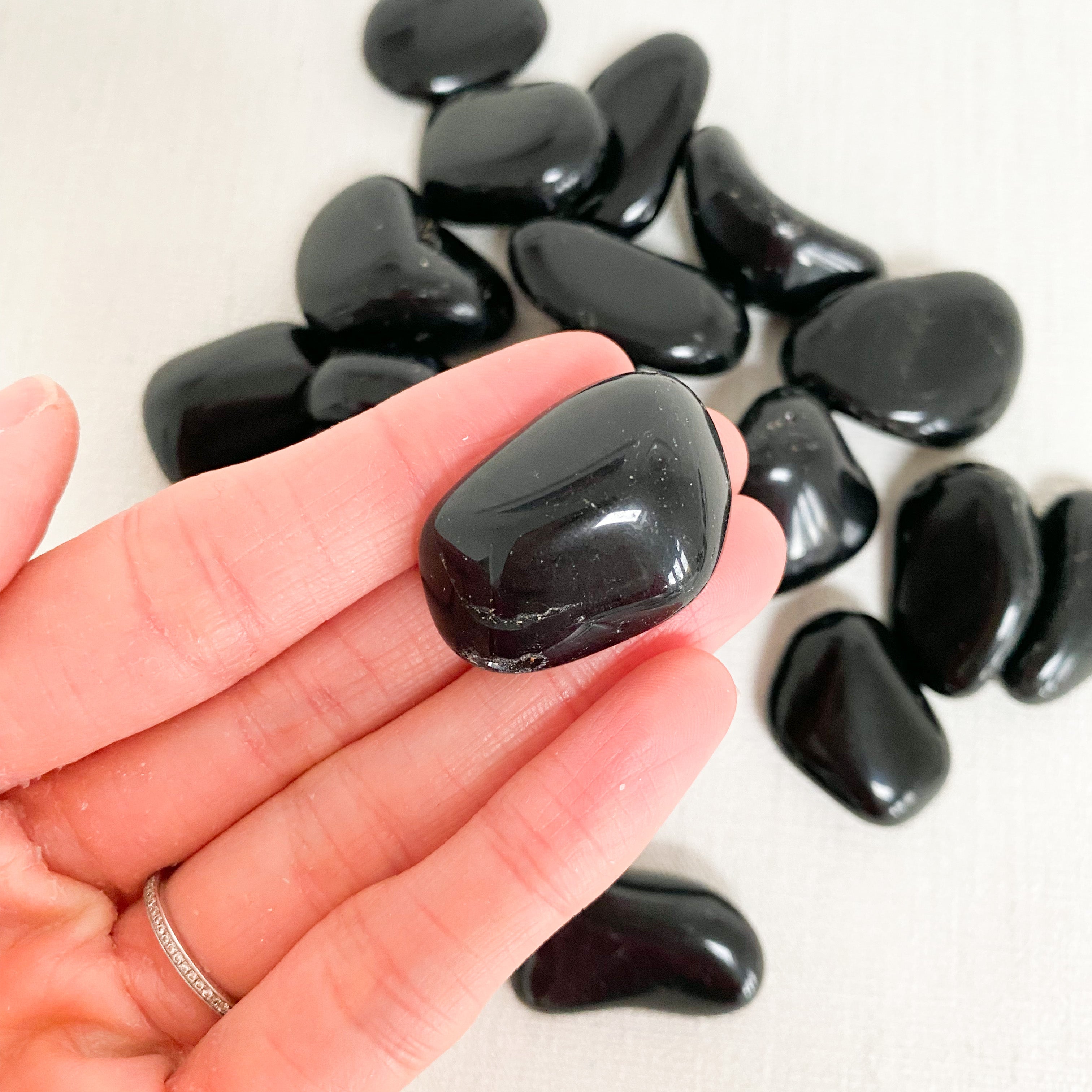 Obsidian tumblestone (with description card)